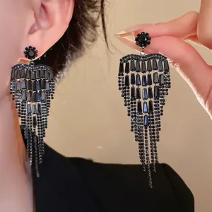 Elegant black tiered zircon tassel earrings with silver needles for formal evening parties.