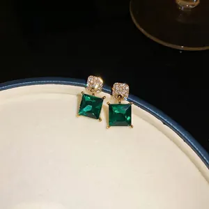 Elegant vintage emerald green square crystal earrings with sparkling rhinestone studs