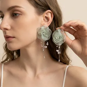 Elegant mint green mesh flower drop earrings with hanging pearls and crystal tassels