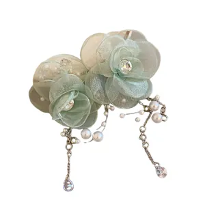 Elegant light green mesh flower necklace with pearls and sparkling zircon water drops.