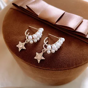 Elegant silver needle U-shape earrings featuring white pearls and zircon star pendants