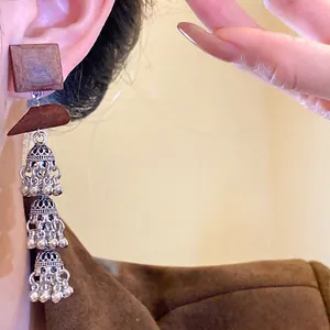 Vintage Bohemian wooden tassel drop earrings with silver needle studs for women