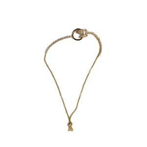 Elegantes vergoldetes geometrisches Armband mit Zirkonia und verstellbarer Kette