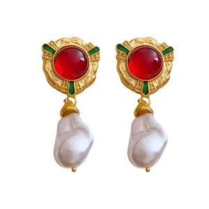 Vintage French palace style gold earrings with red gemstone and baroque pearl drops