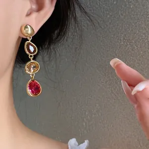 Elegant French vintage gold drop earrings with multi-colored teardrop crystals for women
