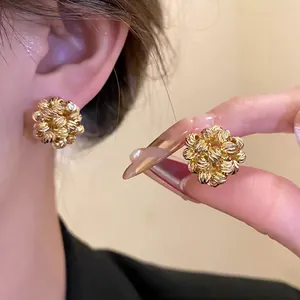 Elegant 18k gold plated flower cluster ear clips with a minimalist round design