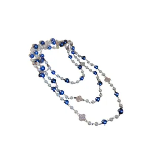 Long vintage sweater chain necklace with blue and white pearls and diamond flower pendants