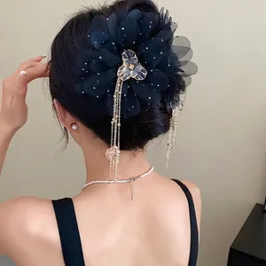Elegant black chiffon flower hair claw clip with rhinestones and long gold tassels