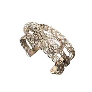 Exaggerated geometric woven silver cuff bracelet with a minimalist multi-layer design