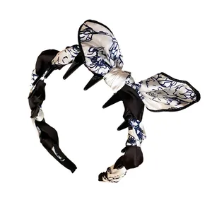 Vintage style silk scarf wrapped bow headband for elegant high skull top hair styling