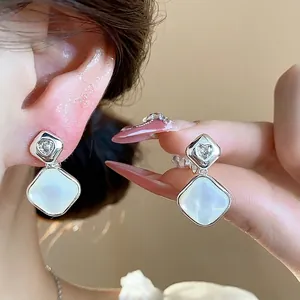 Rhombus 18k gold plated ear clips with heart zircon and mother of pearl inlay