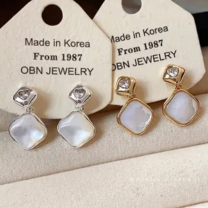 Minimalist 18k gold plated rhombus clip-on earrings with heart-shaped zircon inlay for women