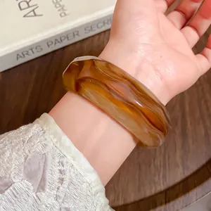 Stylish amber marbled acrylic faceted bangle bracelet with chunky geometric design for women