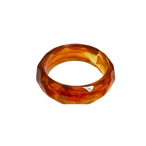 Elegant faceted marbled acrylic bangle with amber tortoise shell pattern for women