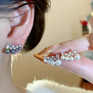 Detailed view of 18k gold plated zircon pearl earrings showing different color options
