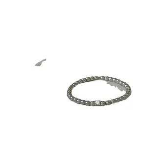 Elegant silver beaded bracelet featuring a single sparkling central zircon stone for women