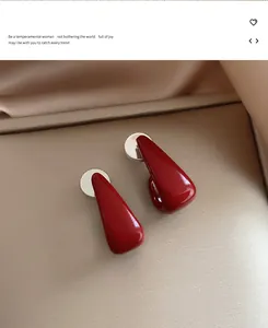 Elegant red enamel teardrop stud earrings with silver needles in a retro geometric design