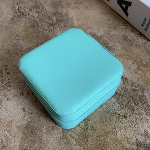 Exquisite mint green portable leather jewelry box with textured finish for rings
