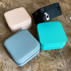 Set of portable faux leather jewelry travel boxes in multiple vibrant colors