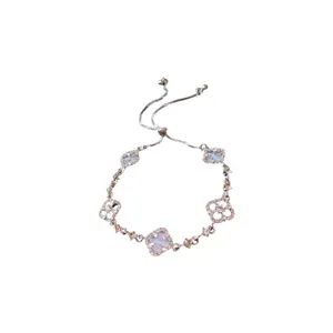 Elegant silver-tone hollow flower bracelet with sparkling crystals and adjustable pull chain