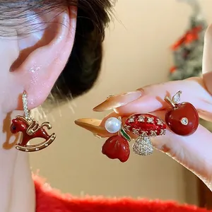 Red enamel and zircon stud earrings set featuring horse, mushroom, and apple festive charms.