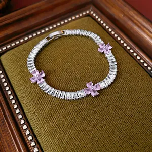 Elegant vintage flower bracelet with pink heart crystals and white baguette stones