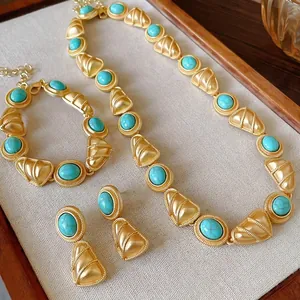 Élégante parure de bijoux géométriques style palais vintage avec turquoises