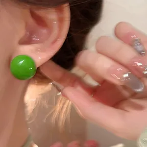 Vibrant green round dopamine stud earrings with silver needles for a fresh sweet look