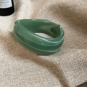 Elegantly crafted minimalist green translucent acrylic chunky bangle bracelet for women