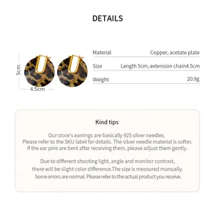 Technical details of leopard print acetate U-shaped earrings with gold plating and size info
