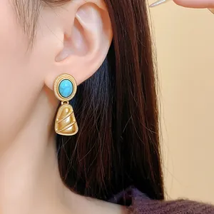 Boucles d'oreilles pendantes géométriques vintage dorées avec pierres turquoises