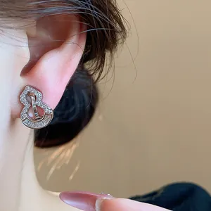 Exquisite detailed view of a sparkling zircon gourd ear clip for non-pierced ears