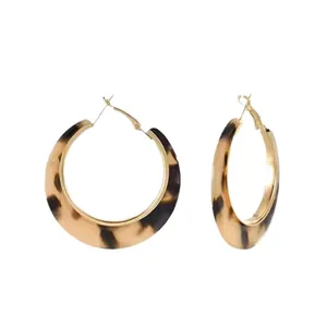 Retro leopard print resin hoop earrings with gold-tone accents for women