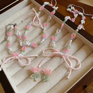 Charming pastoral style beaded choker necklace with pink bowknots and flower accents