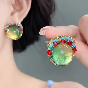 Elegant French vintage round resin earrings with colorful bead accents and gold-tone frame