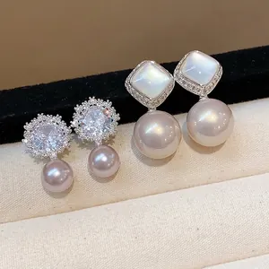 Elegant silver stud earrings with sparkling zircons and luster pearls in two styles