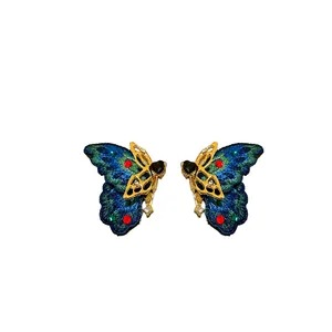 Orecchini a cuore farfalla vintage con ago in argento s925 e ali blu ricamate
