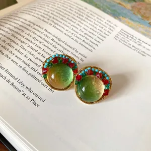 Vintage French court style round green resin earrings with colorful beaded border