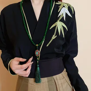 Lange grüne Perlenkette im neuen chinesischen Stil mit Quastenanhänger