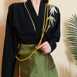 Elegante lange Perlenkette im neuen chinesischen Stil mit grünem Jadeschmuck und Quaste