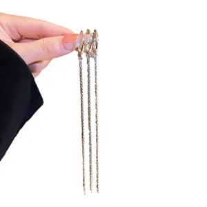 Silver three-layer geometric tassel ear clips featuring an elegant long chain design