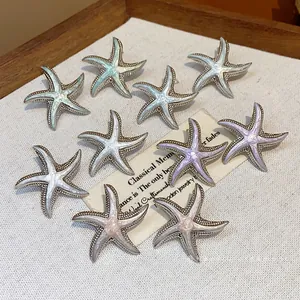 Elegant minimalist starfish enamel stud earrings in assorted pastel colors with silver needles
