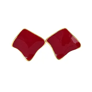 Elegant Ancora red irregular geometric stud earrings with gold-plated rim for women