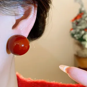 Large round resin stud earrings in Anchorage red for elegant and chic women's jewelry