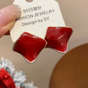 Detailed view of elegant deep red resin geometric stud earrings featuring S925 silver needles