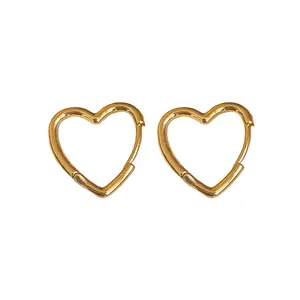 Minimalist gold heart-shaped hoop earrings with a polished smooth finish for women