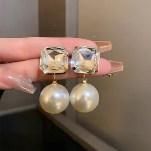 Elegant silver needle earrings with square crystal and large pearl drops for women