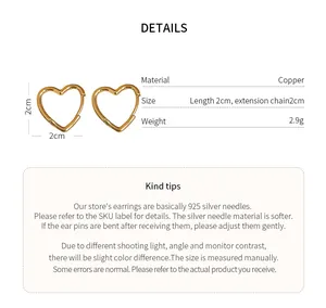 Detail view of heart-shaped gold hoop earrings with dimensions and specifications