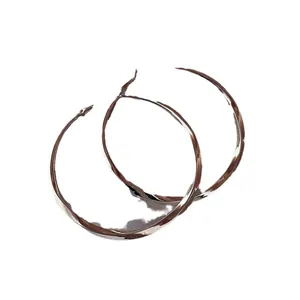 Elegant large silver-colored hoop earrings with a faceted twisted design for women