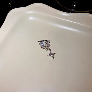 Elegant silver star ear cuff with sparkling cubic zirconia for non-pierced ears